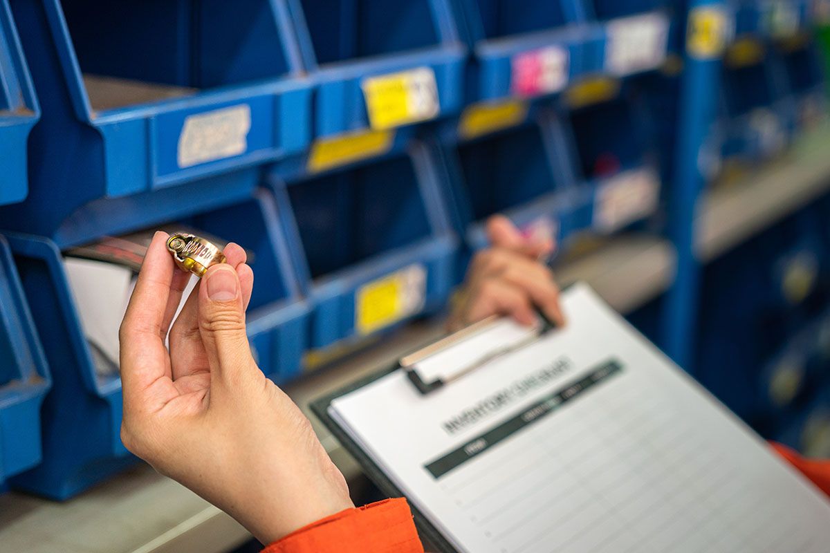 Technician running an equipment inventory checklist