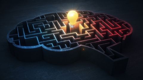 Illuminated brain maze symbolizing problem solving and breakthrough