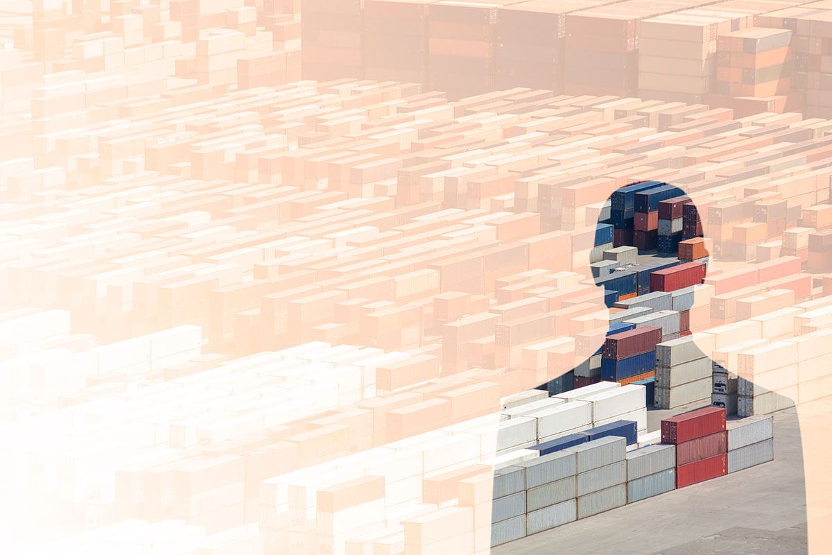 Multiple-exposure silhouettes of business people in motion